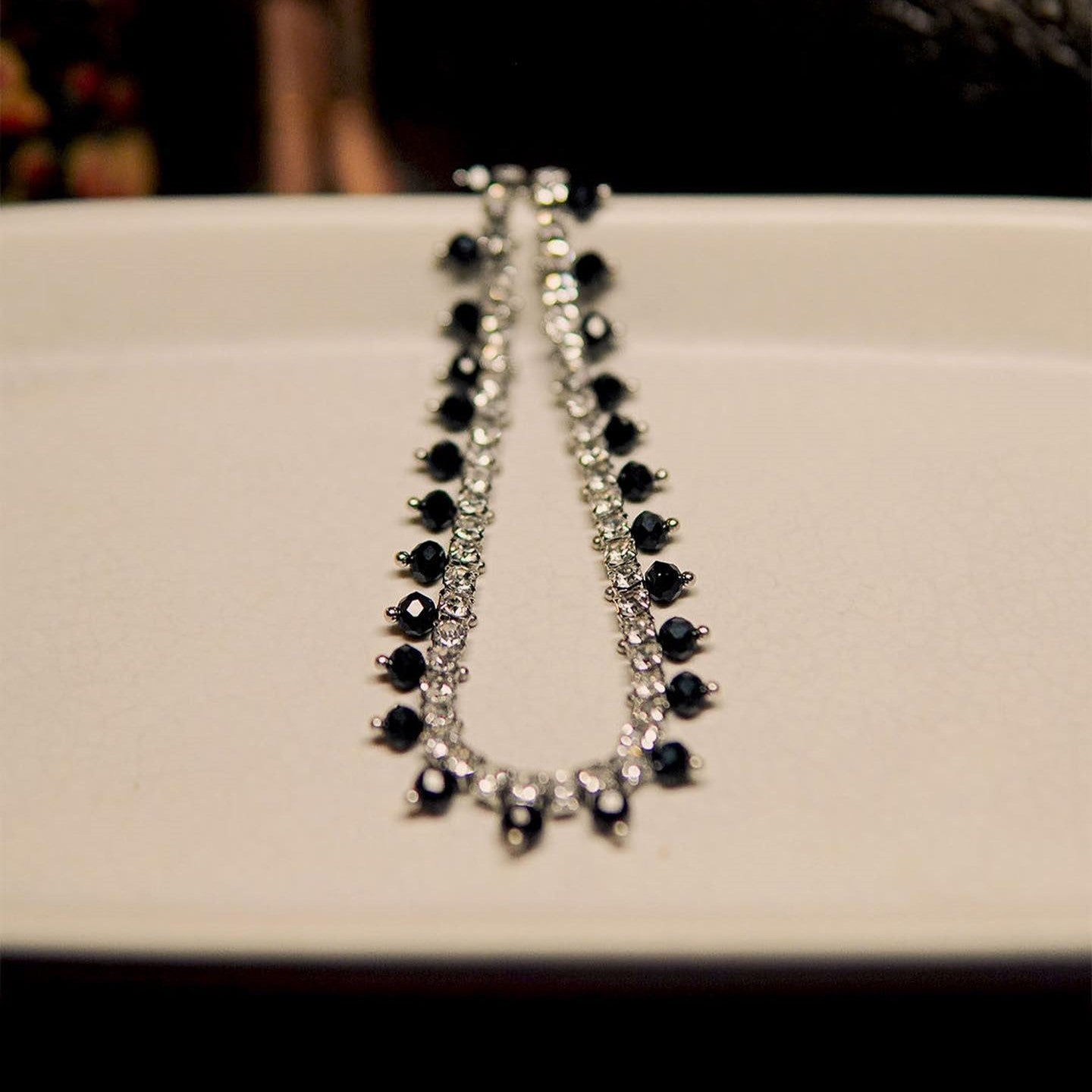 Black bead silver anklet